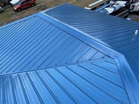 copper metal roof blue house|blue metal roof interior.